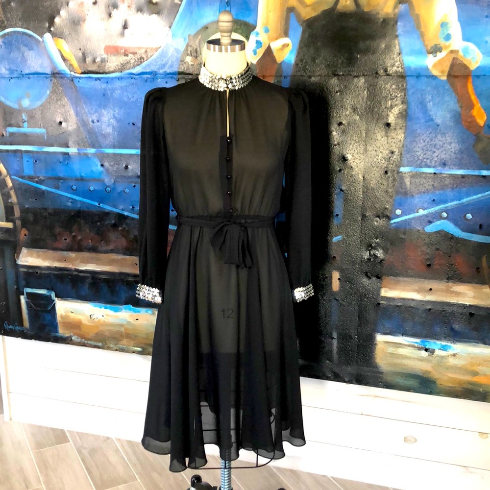 Sheer black dress with silver sequins on trim